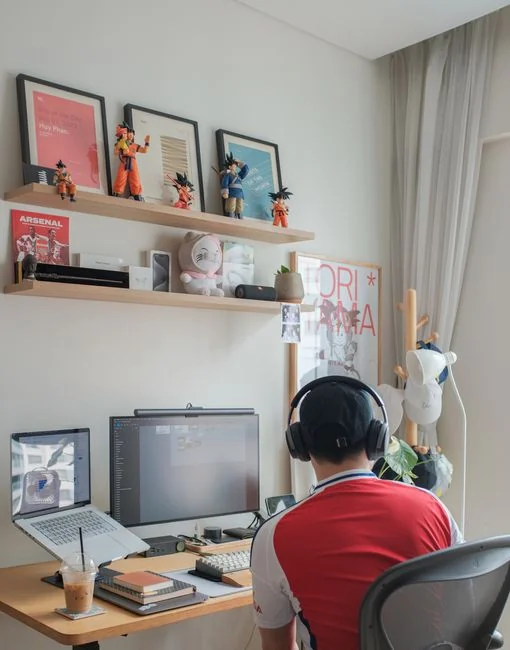 A contemporary workspace showcasing a laptop, tablet, and smartphones, ideal for tech and freelance use.